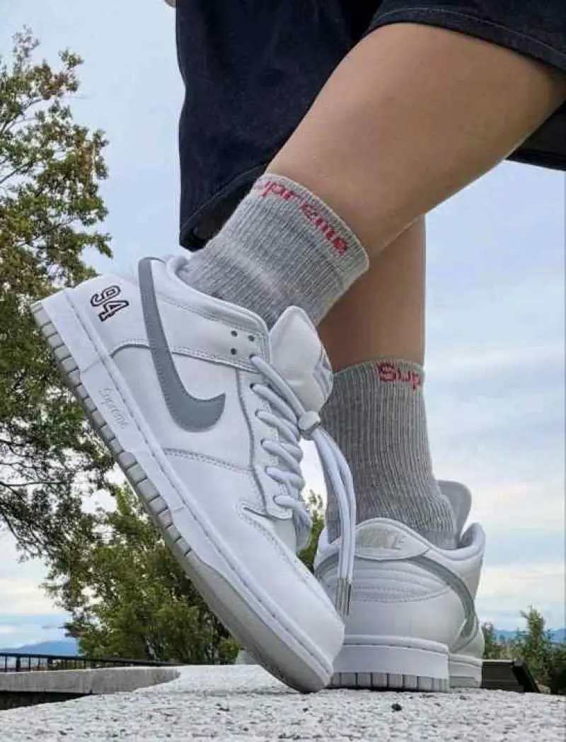 Supremee x Nikke SB Dunk Low WhiteMetallic Silver - Image 3