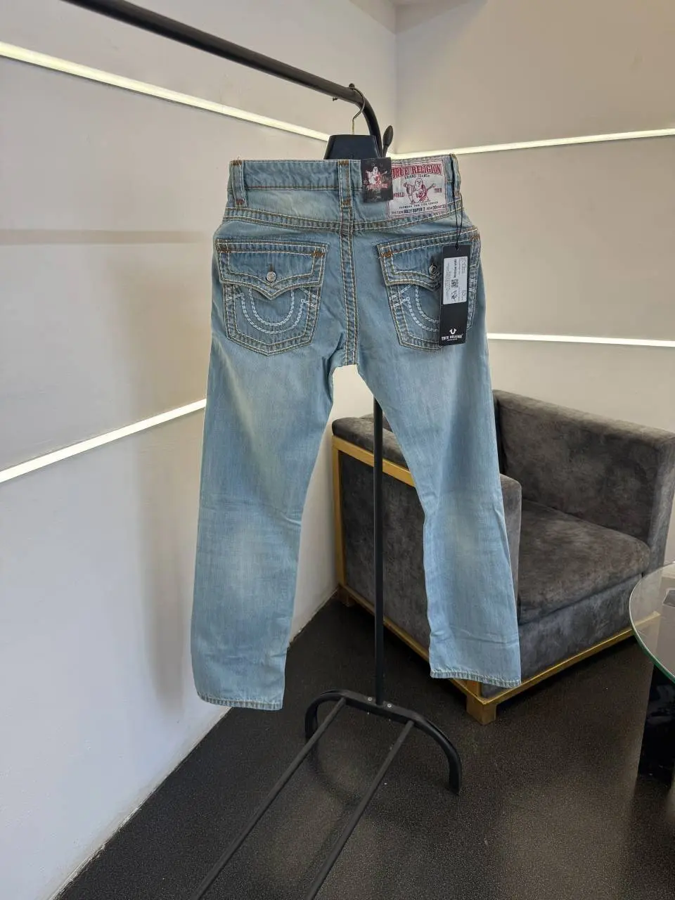 True religion hyperflex sky blue imported denim with brand button and pattern on back - Image 3