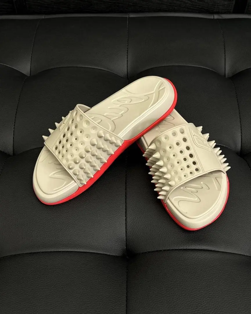 Christian louboutii.n take it easy slides bbeige
