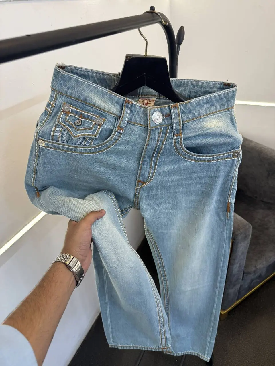 True religion hyperflex sky blue imported denim with brand button and pattern on back - Image 2