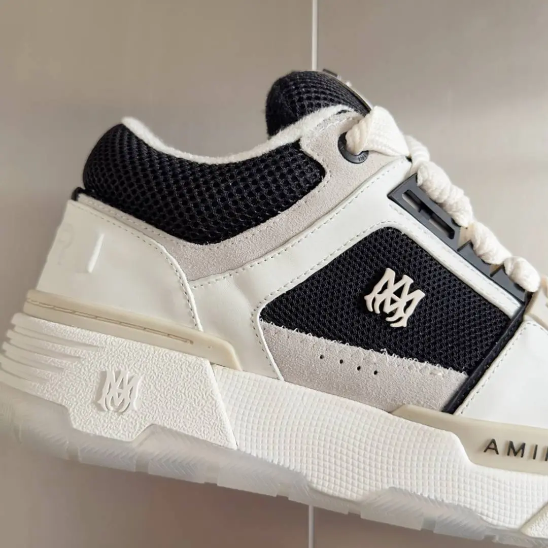 MA 1 sneakers in a white and black - Image 4