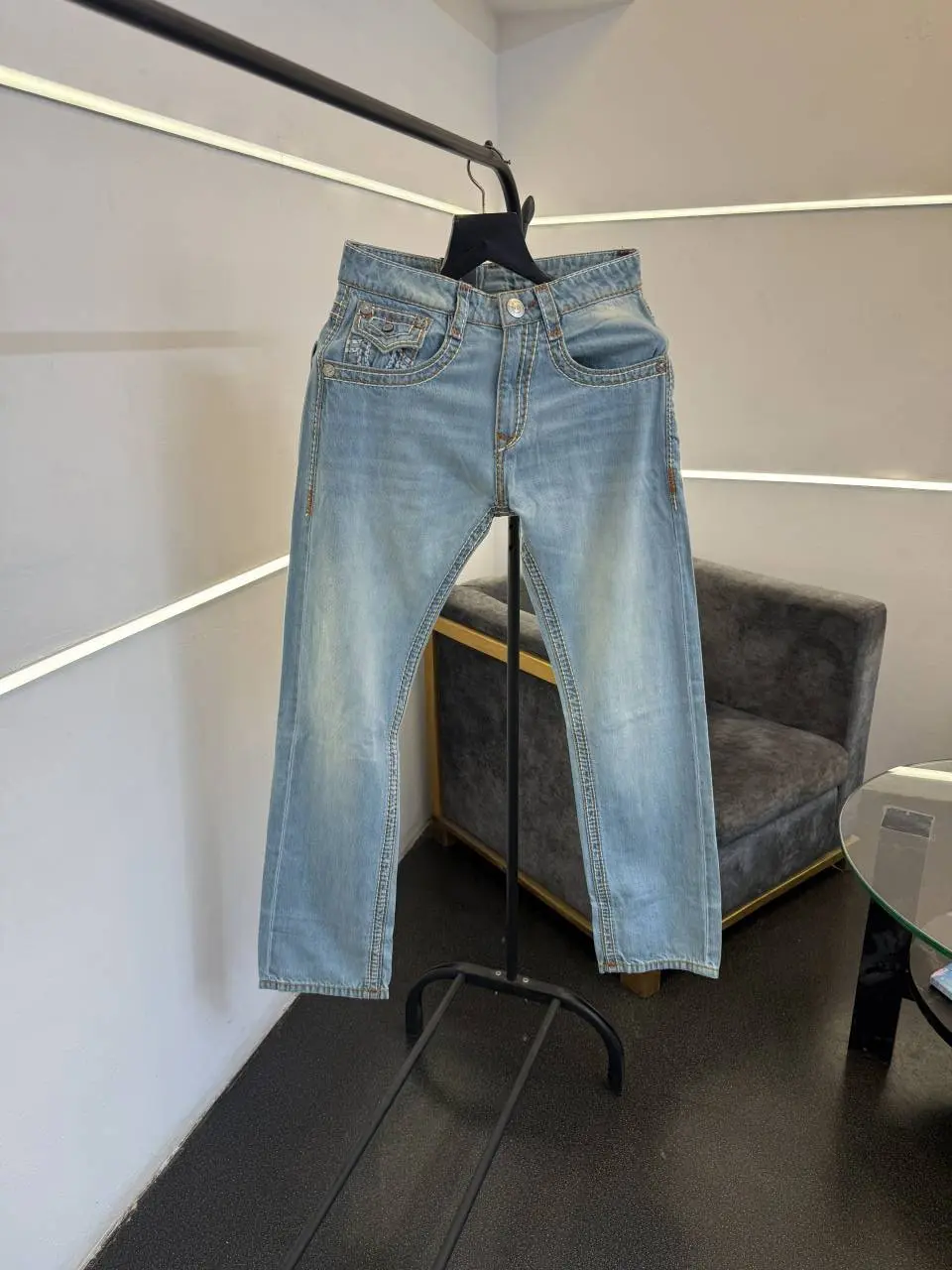 True religion hyperflex sky blue imported denim with brand button and pattern on back