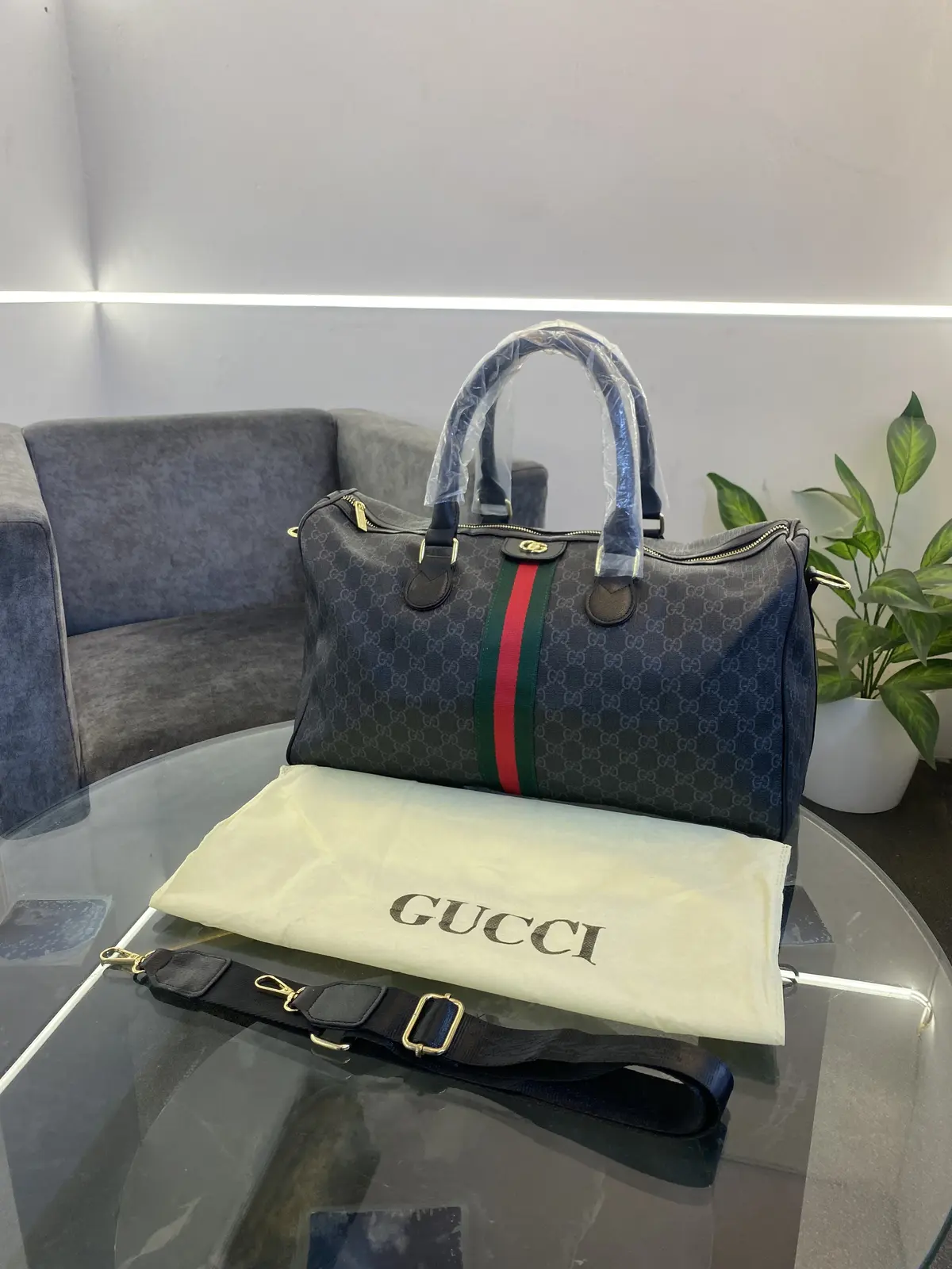 Gucci monogram steel logo duffle bag with dust bag and brand strap black grey