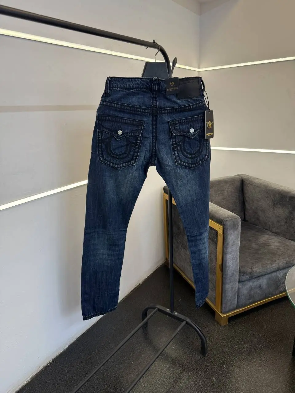 True religion hyperflex blue imported denim with brand button and pattern on back - Image 3