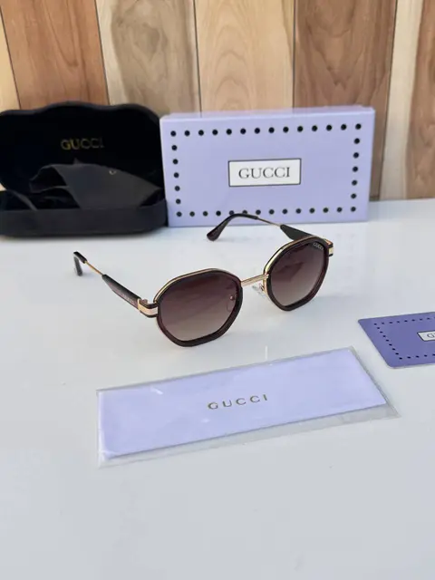 Gucci 618 gold brown