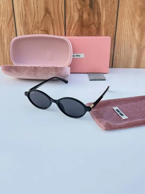 Miu miu 5519 black gold