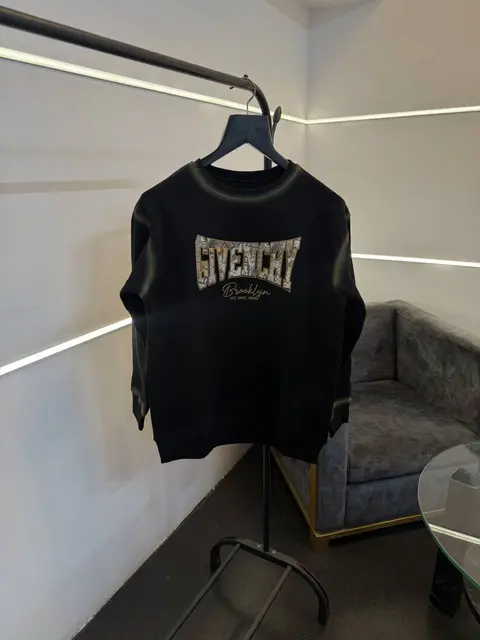 Givenchy imported fleece sweatshirt with spray print and front branding black