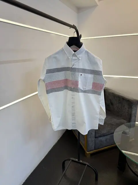 Tommy hilfigar imported front pocket shirt with brand button and embroidery logo on chest white