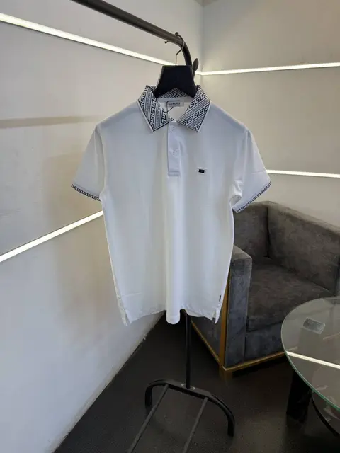 Versace white imported polo tshirt with brand buttons and knitted collar with sleeves