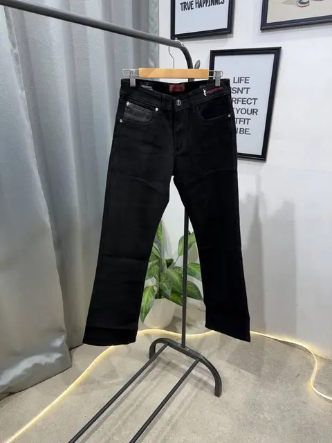 YSL boot cut imported jet black denim with brand buttons and packing