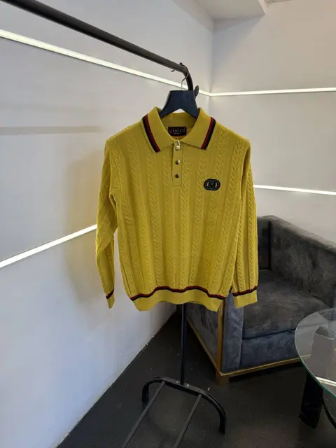 Gucci knitted imported sweatshirt with brand button and logo on chest yellow gold